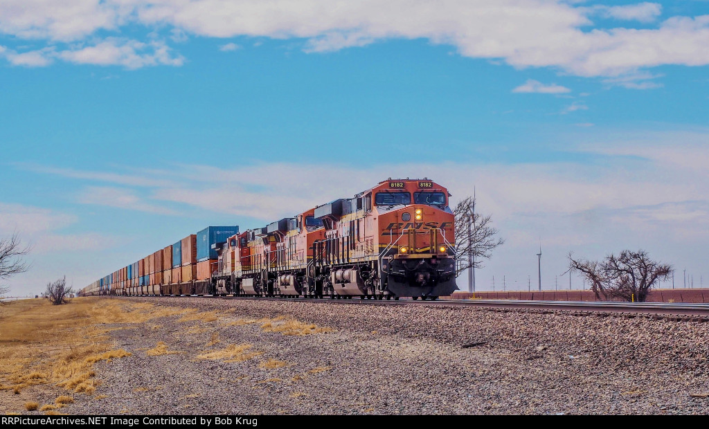 BNSF 8182 leads eastbound stacks